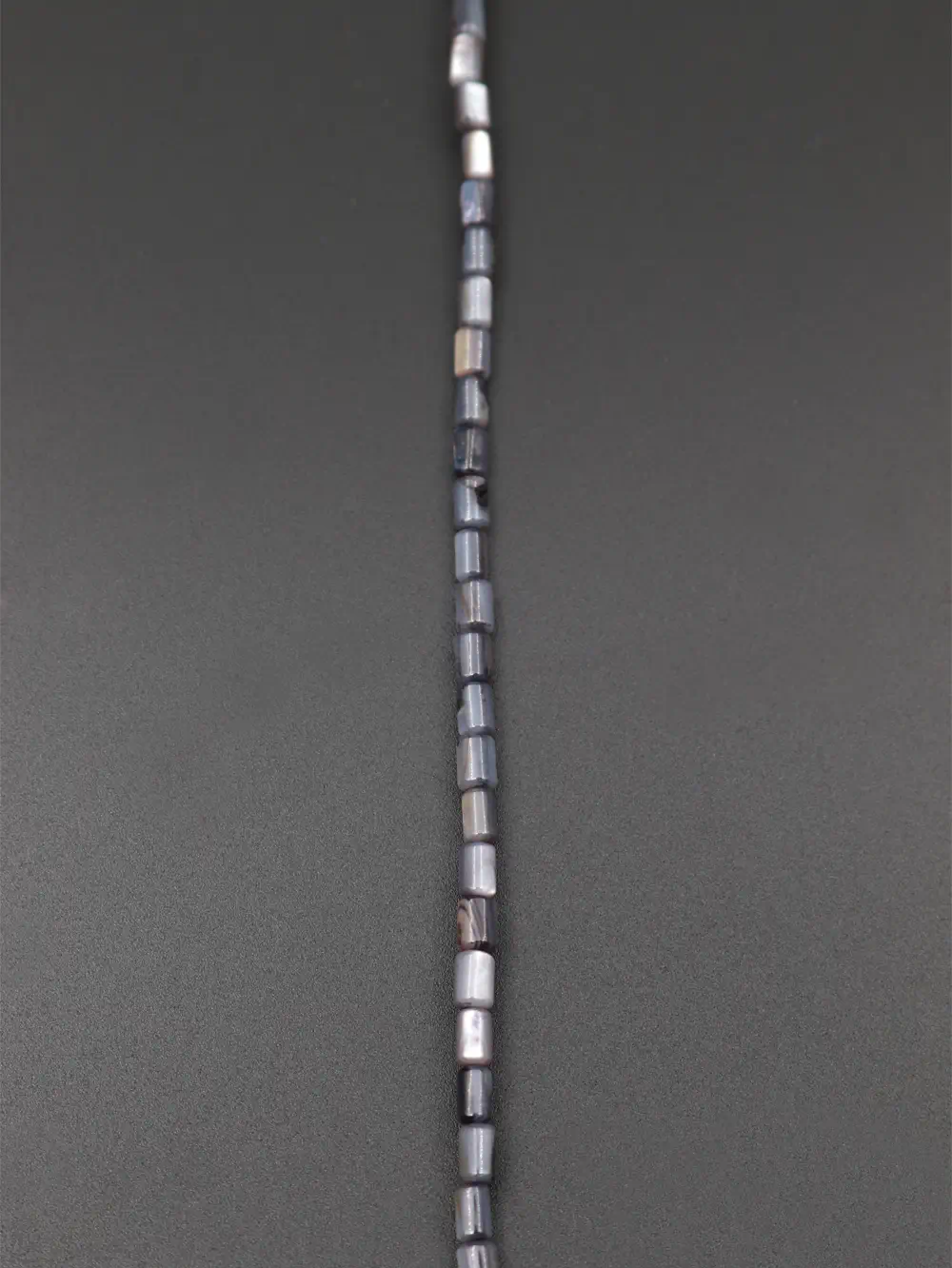 TIRA DE NACAR TUBO COLOR NEGRO