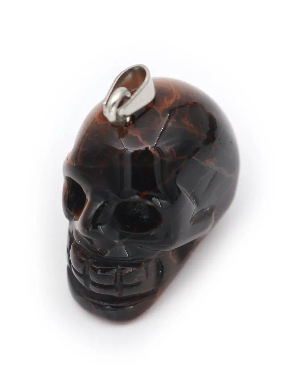 DIJE DE PIEDRA OJO DE TIGRE EN FORMA DE CABEZA DE CALAVERA