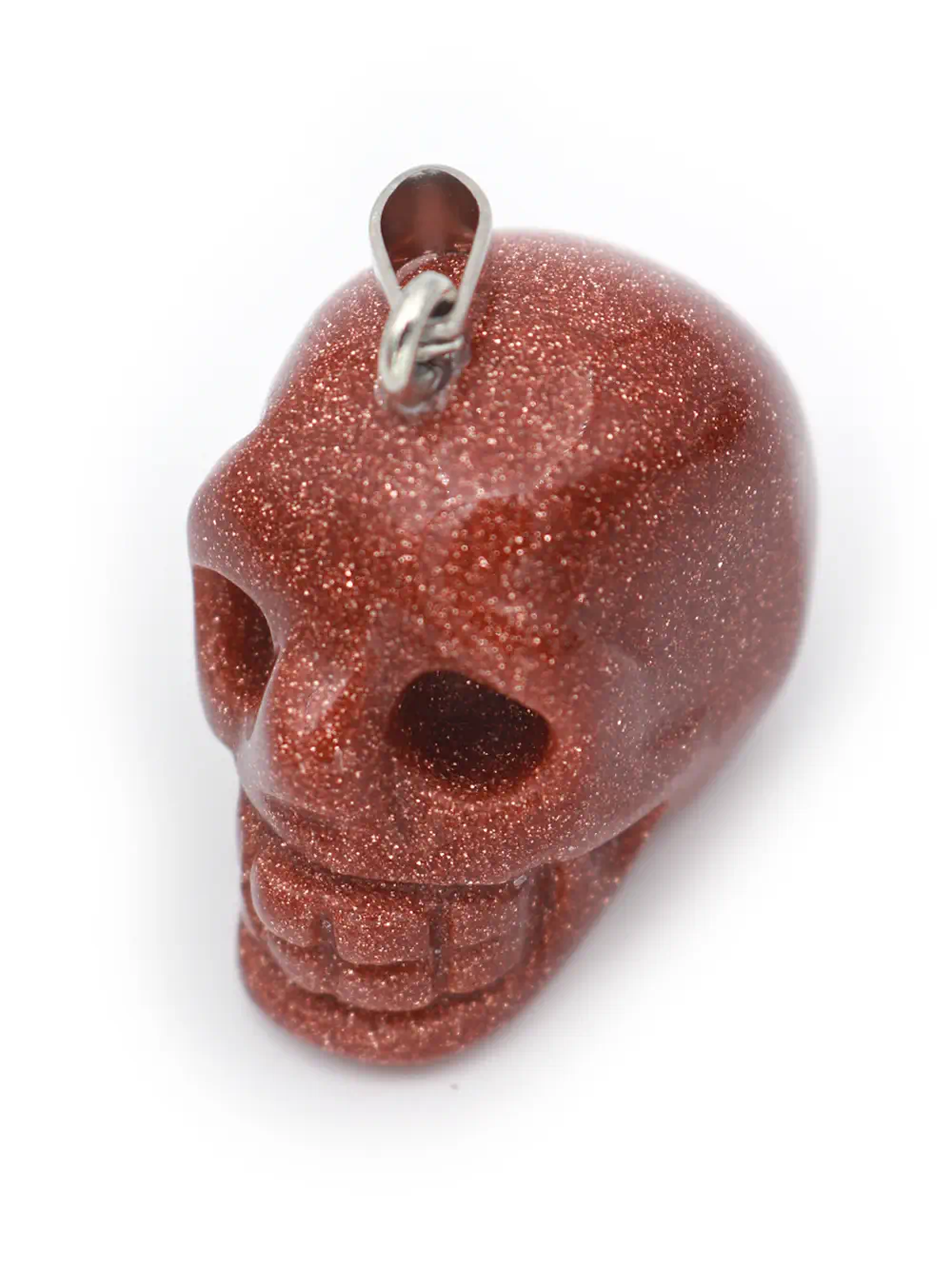 DIJE DE PIEDRA LLUVIA DE ORO EN FORMA DE CABEZA DE CALAVERA